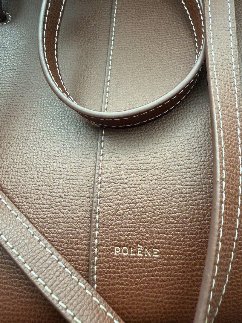 Polène Cyme Mini cognac (Category: Luxury Bags & Wallets) located in Cainta. Submitted by lovedbyiris975 (Listing ID 1468303053, Image 3). Description: - buttons still have protective layer of plastic - Complete with original dust bag, booklet, and white storage box.