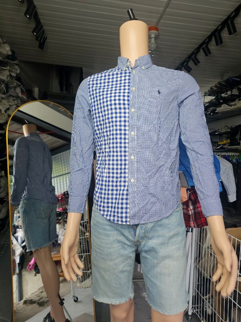 Polo Ralph Lauren long-sleeve button-down shirt (Category: Formal Shirts) located in Baguio. Submitted by kayeonlineshop (Listing ID 1468298767, Image 1). Description: Polo Ralph Lauren long-sleeve button-down shirt featuring an asymmetrical or "fun/crazy" pattern mix of blue and white gingham checks..