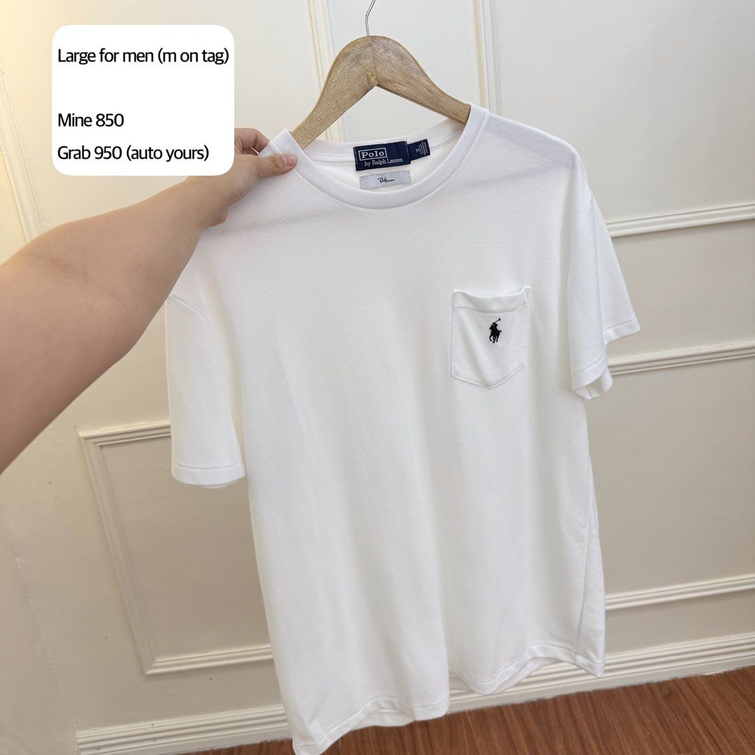 Polo Ralph Lauren White T-Shirt with Pocket (Category: Tshirts & Polo Shirts ) located in Manila. Submitted by angelll0123 (Listing ID 1468450421, Image 1). Description: - Brand: Polo Ralph Lauren - Color: Clean White - Size: Tag says Medium, but fits like Men's Large - Design: Crew neck, short sleeves, and chest pocket with black embroidered logo - Condition: Excellent, simple everyday t-shirt.