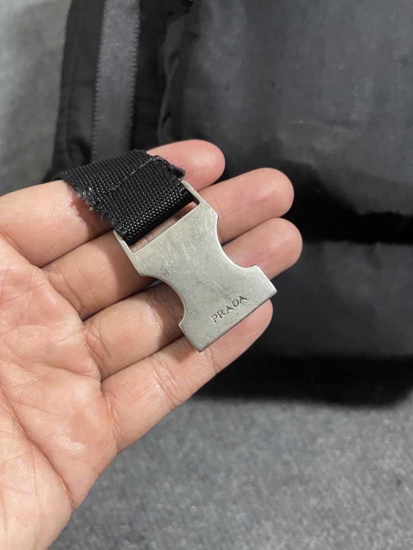 Prada Black Nylon Backpack (Category: Backpacks) located in Iligan City. Submitted by lovelysism (Listing ID 1468323747, Image 3). Description: - Brand: Prada - Color: Classic Black - Material: Durable signature nylon -excellent condition No issue With tags .