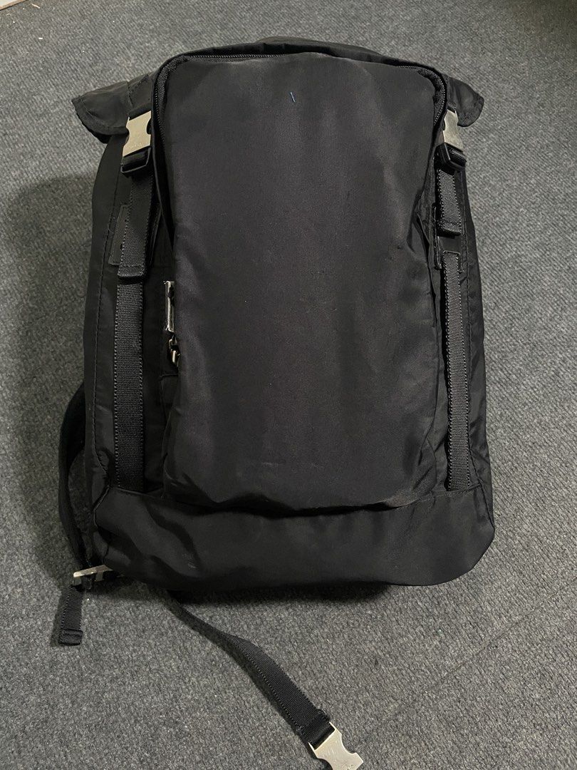 Prada Black Nylon Backpack (Category: Backpacks) located in Iligan City. Submitted by lovelysism (Listing ID 1468323747, Image 1). Description: - Brand: Prada - Color: Classic Black - Material: Durable signature nylon -excellent condition No issue With tags .
