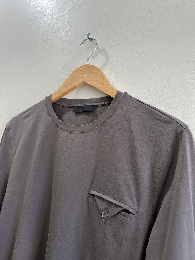 Prada Long Sleeve (Category: Coats, Jackets and Outerwear) located in Baguio. Submitted by .daryl (Listing ID 1468342294, Image 2). Description: 19 width 27 length .