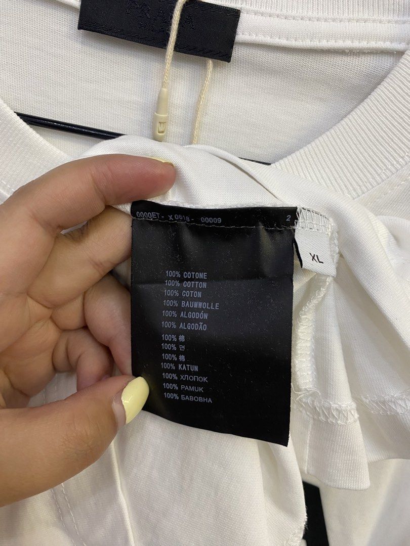 PRADA SWEATER (Category: Luxury Apparel) located in Baguio. Submitted by lairdegawd_06 (Listing ID 1468461405, Image 3). Description: Dimes-24x30 Excellent condition 10/10 color rate No flaw Complete tags Check photos for more details.
