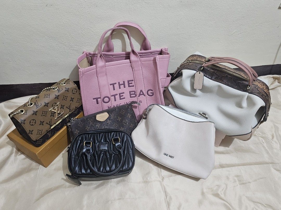pre-loved bags (Category: Luxury Bags & Wallets) located in Caloocan City. Submitted by hy4mii (Listing ID 1468475594, Image 1). Description: for sale pre-loved bags 👜 TAKE ALL FOR ₱5,500 — marc jacobs the jacquard medium tote bag (1000) — nine west tomasa crossbody (1500) — coach lane satchel (1700) — louis vuitton pochette (700) — miu miu (250) — louis vuitton w/ box (500) loc: north caloocan city mod: sdd | meet-up dm for inquiries !.