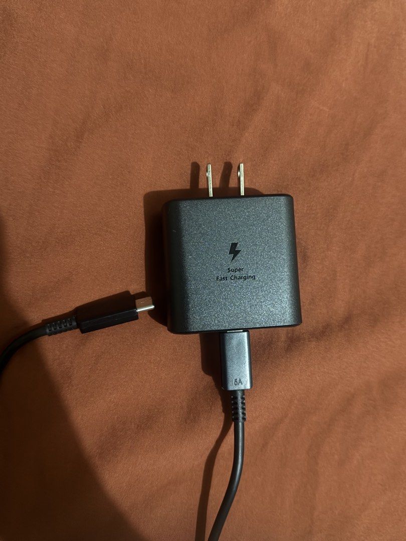 Preloved Original 45w Samsung charger (Category: Chargers & Cables) located in Manila. Submitted by bloodyrain (Listing ID 1468476035, Image 1). Description: Preloved Original 45w Samsung charger Gamit s23 ultra no issue Super fast charging 2.0 fast charger.
