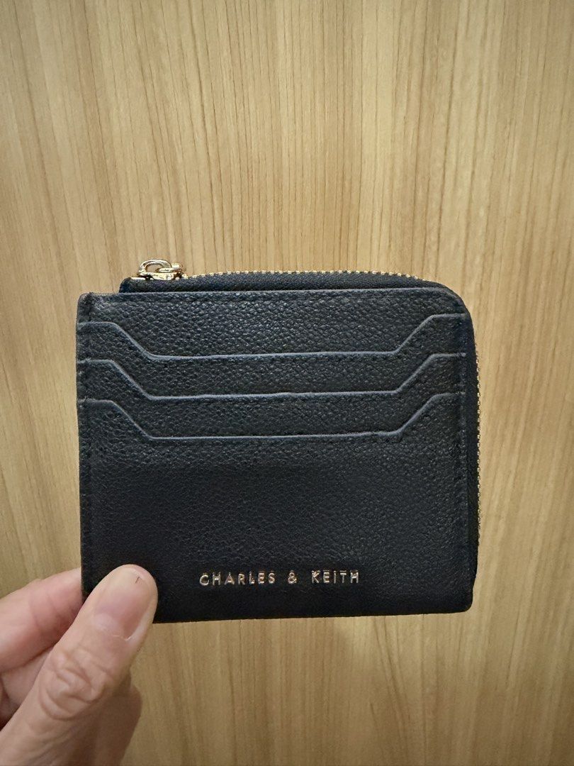 [Pre-loved] Original Charles & Keith Cardholder (Category: Wallets & Card holders) located in Caloocan City. Submitted by nanadoie_ (Listing ID 1468401849, Image 1). Description: Pre-loved ✨ Original ✨ No box Bought din also sa physical store but cant remember san branch Rfs: decluttering MOP: bpi/gcash MOD: j&t / lalamove / grab.