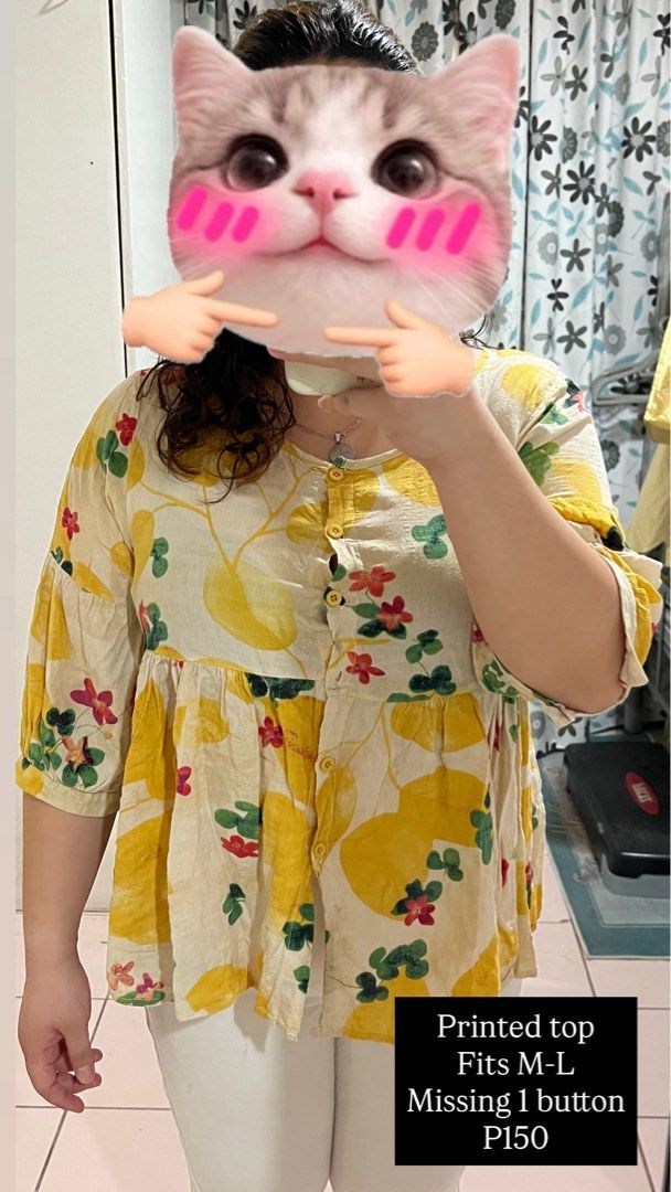 Printed top (Category: Blouses) located in Cebu City. Submitted by fromreggg (Listing ID 1468321326, Image 2). Description: Printed top Fits M-L Missing 1 button P150 .