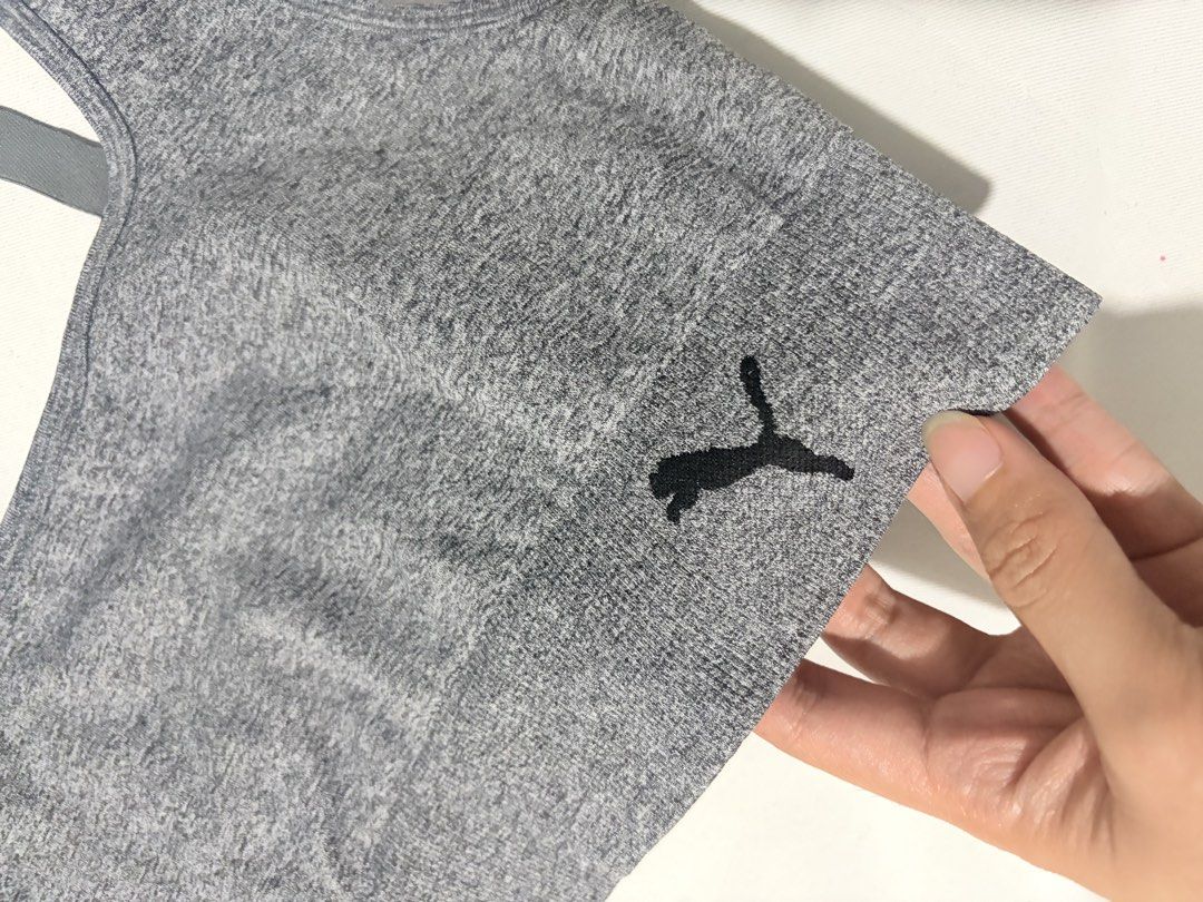 Puma Heather Grey (Category: Activewear) located in Taguig. Submitted by vm.co (Listing ID 1468342703, Image 2). Description: Puma Sports Bra Size M | Heather gray fabric with a stretch fit, adjustable straps, and a comfortable ribbed band perfect for workouts and everyday activewear..