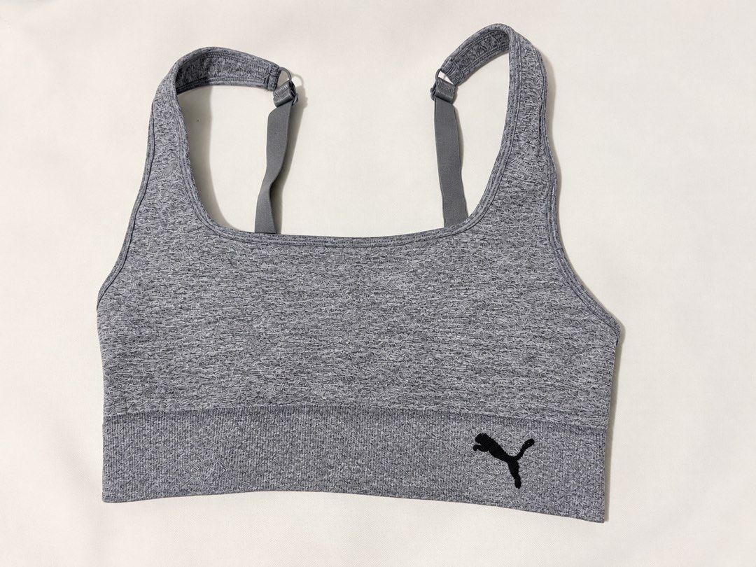 Puma Heather Grey (Category: Activewear) located in Taguig. Submitted by vm.co (Listing ID 1468342703, Image 1). Description: Puma Sports Bra Size M | Heather gray fabric with a stretch fit, adjustable straps, and a comfortable ribbed band perfect for workouts and everyday activewear..