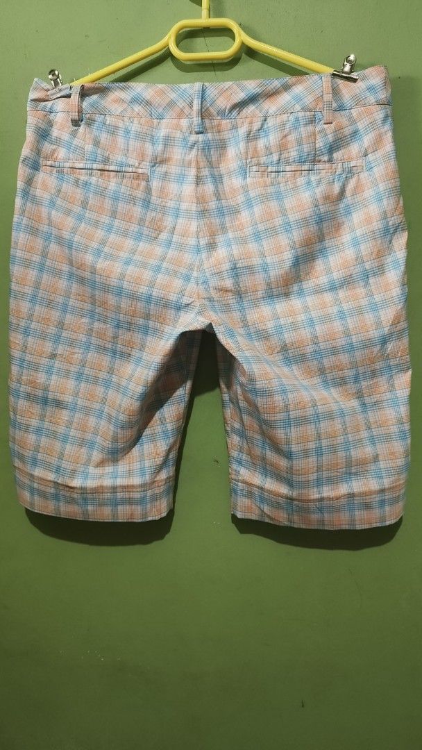 Puma Plaid Shorts Multi-color (Category: Shorts) located in Aborlan. Submitted by tonsky_thrift (Listing ID 1468333046, Image 2). Description: ‎📌 Dimes: waistline 35 length 21 hem 10 ‎📌 Colorate: 10/10 ‎📌 excellent condition, like new ‎📌 Issue:none - Brand: Puma Sportlifestyle - Design: Orange, blue, and white plaid pattern with embroidered orange Puma cat logo - Closure: Zipper fly with button closure - Pockets: Two front pockets and two bac