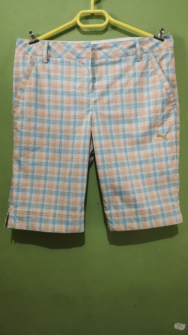 Puma Plaid Shorts Multi-color (Category: Shorts) located in Aborlan. Submitted by tonsky_thrift (Listing ID 1468333046, Image 1). Description: ‎📌 Dimes: waistline 35 length 21 hem 10 ‎📌 Colorate: 10/10 ‎📌 excellent condition, like new ‎📌 Issue:none - Brand: Puma Sportlifestyle - Design: Orange, blue, and white plaid pattern with embroidered orange Puma cat logo - Closure: Zipper fly with button closure - Pockets: Two front pockets and two bac