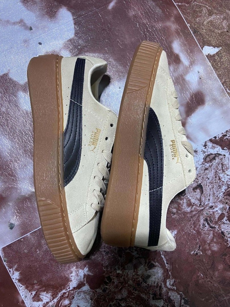 Puma Suede Platform Gum Sole Sneakers (Category: Sneakers) located in Manila. Submitted by alexson10 (Listing ID 1468449412, Image 2). Description: - Brand/Model: Puma sneakers - Color/Material: Beige suede with black side stripes - Sole: Thick gum platform with textured rubber for extra grip - Details: Gold foil branding on tongue and side, unique repeated Puma logo print on insoles - Closure: Regular lace-up - Style: Classic chunky silhouette S