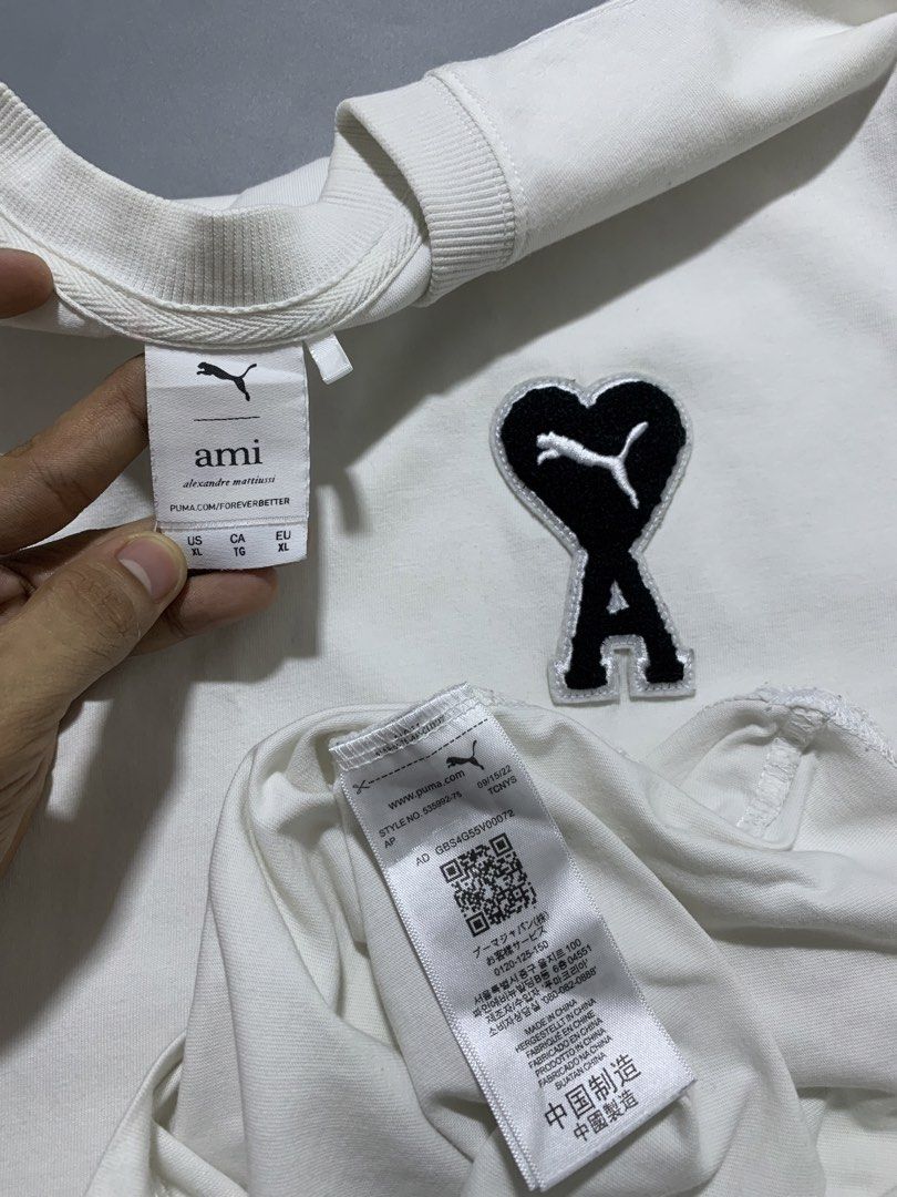 Puma x Ami Tee (Category: Activewear) located in Mabalacat. Submitted by thrift_trap (Listing ID 1468392488, Image 3). Description: Dimes: W22 x L27 (Size: XL on tag) Condition: Excellent Issue (s): Minimal stain (removable) Color rate: 9.5/10 Complete tags🏷️ Color may vary due lighting‼️.