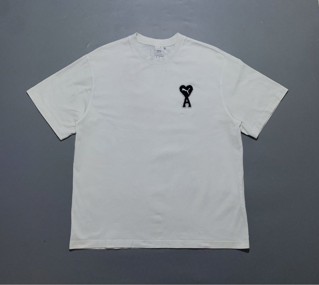 Puma x Ami Tee (Category: Activewear) located in Mabalacat. Submitted by thrift_trap (Listing ID 1468392488, Image 1). Description: Dimes: W22 x L27 (Size: XL on tag) Condition: Excellent Issue (s): Minimal stain (removable) Color rate: 9.5/10 Complete tags🏷️ Color may vary due lighting‼️.