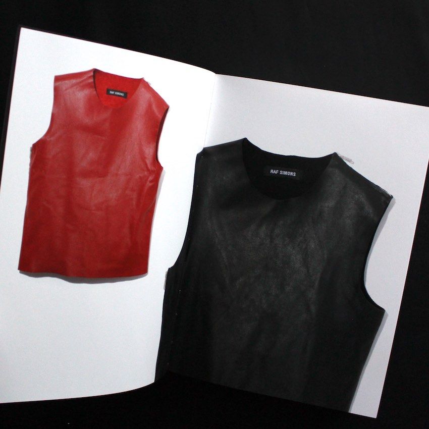 Raf Simons - S/S’12 Runway - Leather - Side & Shoulder zip (Category: Vests) located in Cavite. Submitted by asianluxe (Listing ID 1468432282, Image 2). Description: Raf simons - ss12 runway - Black Leather- Flat Measurements! 20 inches armpit to armpit 25.5 inches length 16.5 inches shoulder to shoulder 14.5 inches chest 20 inches hem excellent condition Very presentable 10/10 condition Authentic Archive raf simons If u interested my item, Drop 