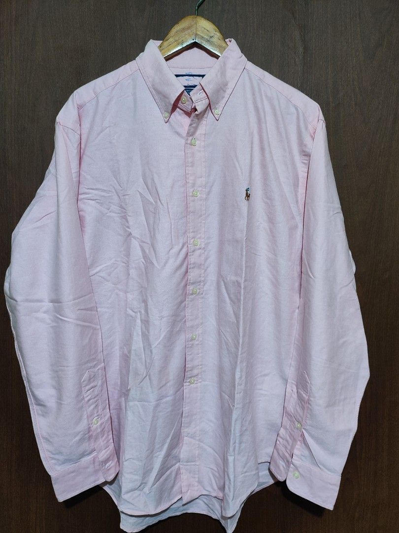 Ralph lauren longsleeve light pink (Category: Formal Shirts) located in Pasig City. Submitted by supremokicksmanila (Listing ID 1468478102, Image 1). Description: Ralph lauren longsleeve light pink 26x31 fits fits to xl excellent condition cut tag only 1799 shipped dm to purchase lalamove with in metromanil j&t delivery outside mertomanila.