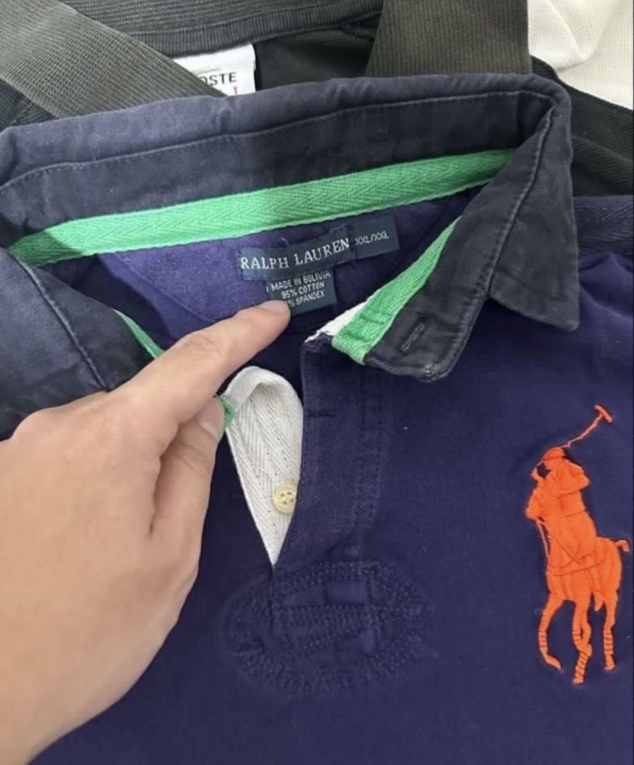 Ralph Lauren Polo Shirt big logo (Category: Tshirts & Polo Shirts ) located in Subic. Submitted by declutterbyshit (Listing ID 1468340789, Image 2). Description: - Brand: Ralph Lauren Mom’s old clothes This is for womens 23 length 17 width - Material: 95% cotton, 5% spandex blend (made in Bolivia) - Details: Contrasting green inner collar lining and white button placket - Condition: Great for classic casual wear - DM for fast transactions and shi