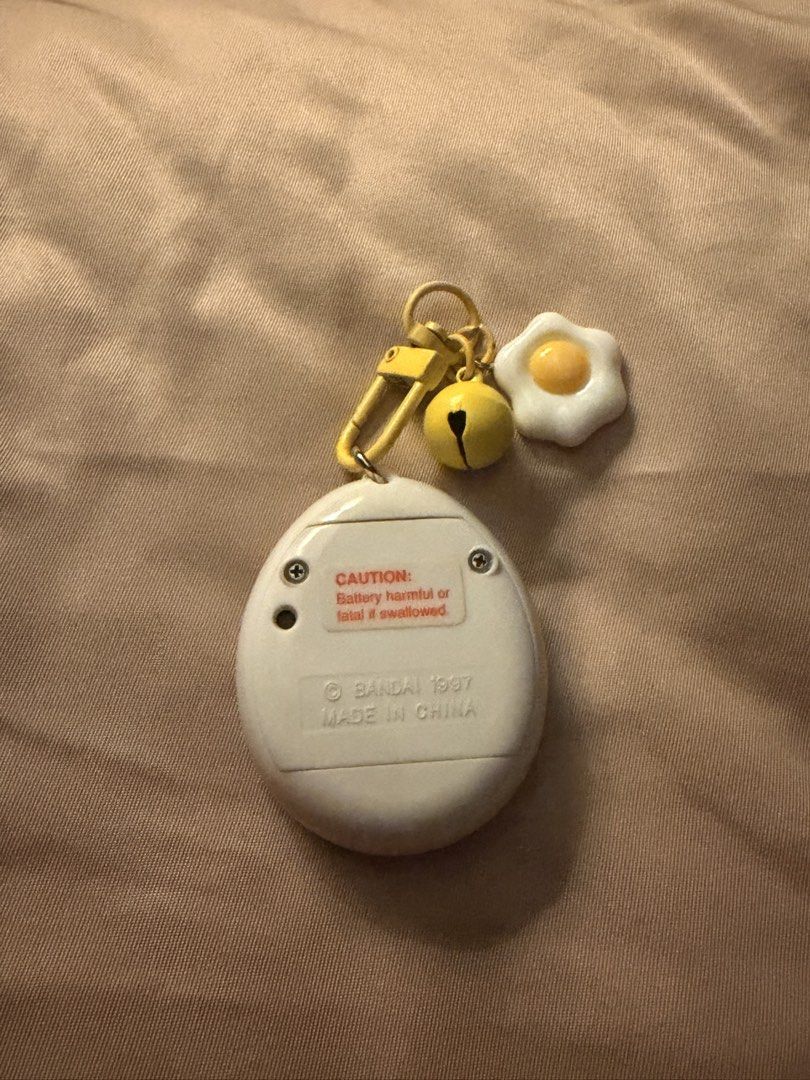 RARE 1997 Tamagotchi Virtual Pet (Category: Interactive Toys) located in Quezon City. Submitted by evaevaa (Listing ID 1468475835, Image 3). Description: 1997 Nostalgia perfect working condition rare original Bandai Tamagotchi .