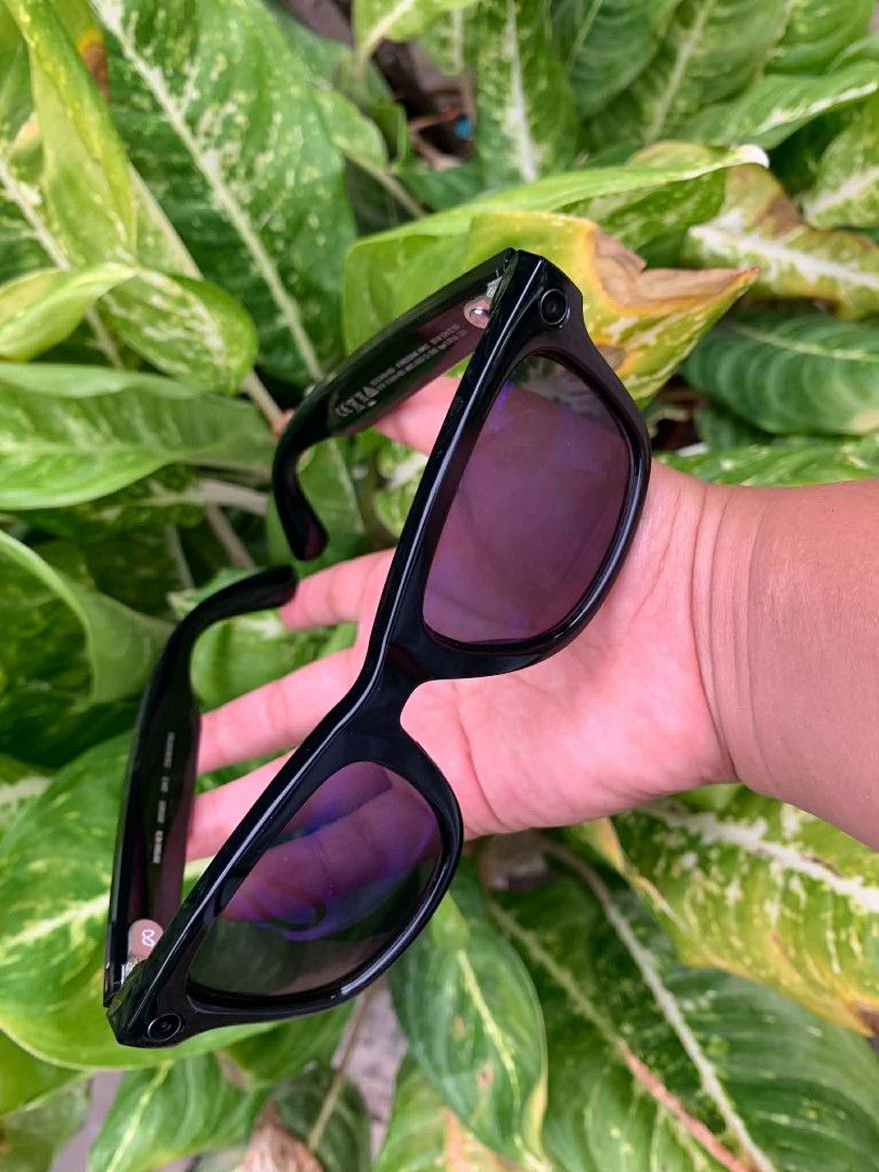 Ray-Ban Meta Smart Glasses Black (Category: Sunglasses & Eyewear) located in Lapu Lapu. Submitted by margaux099 (Listing ID 1468454979, Image 2). Description: - Authentic Ray-Ban Meta smart glasses - Color: Classic Black with sleek glossy finish and dark lenses - Frame: Standard Wayfarer style with visible branding and temple markings - Features: Integrated camera and high-quality audio built right into the frame - Condition: Great daily tech acc
