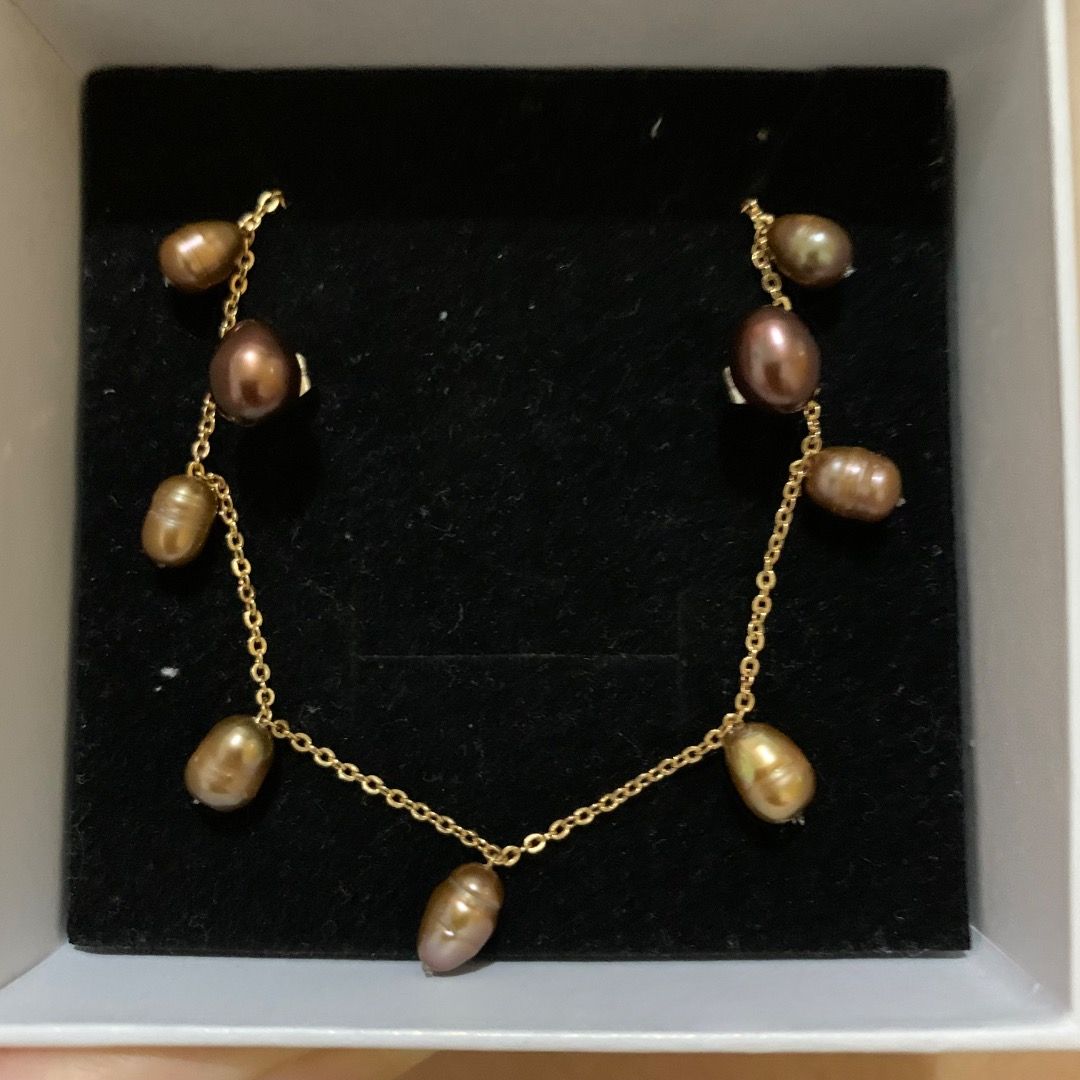 Real freshwater Brown pearl Set (Category: Necklaces) located in Quezon City. Submitted by itscxyy (Listing ID 1468070386, Image 1). Description: - Stainless steel gold-tone necklace and stud earrings - Accented with evenly spaced real freshwater brown pearls necklace paired with stud earrings - Dainty style, perfect for everyday wear or layering.