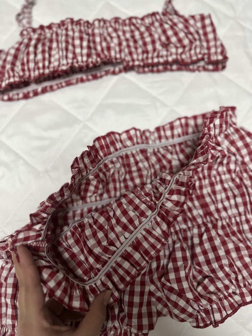 Red and White Gingham Ruffle Crop Top Shorts Set (Category: Sets or Coordinates) located in Valenzuela. Submitted by prelovedbyramsie (Listing ID 1468405334, Image 3). Description: Red and white gingham two-piece set. Crop top features thin straps and stretchy gathered fabric. Matching shorts come with an elastic waistband and layered ruffles. Super lightweight material..