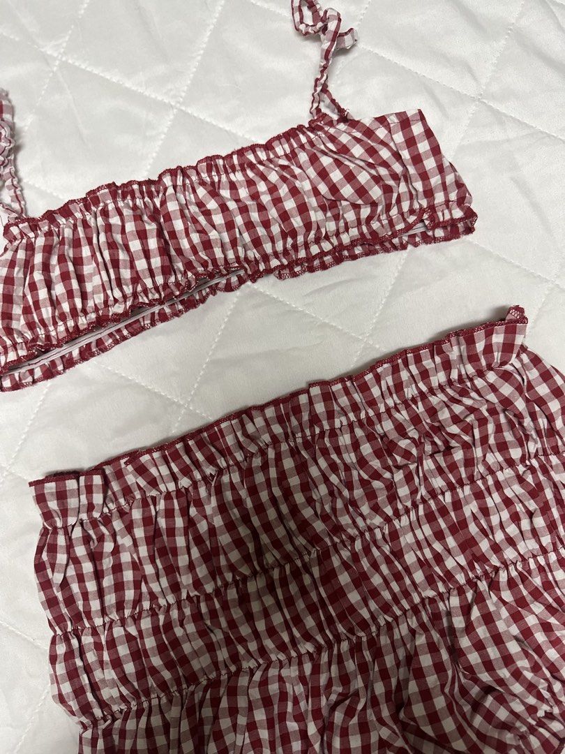 Red and White Gingham Ruffle Crop Top Shorts Set (Category: Sets or Coordinates) located in Valenzuela. Submitted by prelovedbyramsie (Listing ID 1468405334, Image 2). Description: Red and white gingham two-piece set. Crop top features thin straps and stretchy gathered fabric. Matching shorts come with an elastic waistband and layered ruffles. Super lightweight material..