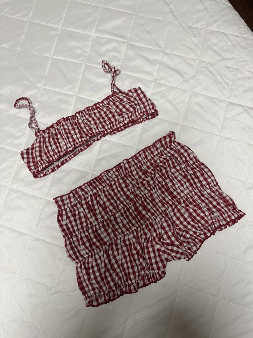 Red and White Gingham Ruffle Crop Top Shorts Set (Category: Sets or Coordinates) located in Valenzuela. Submitted by prelovedbyramsie (Listing ID 1468405334, Image 1). Description: Red and white gingham two-piece set. Crop top features thin straps and stretchy gathered fabric. Matching shorts come with an elastic waistband and layered ruffles. Super lightweight material..