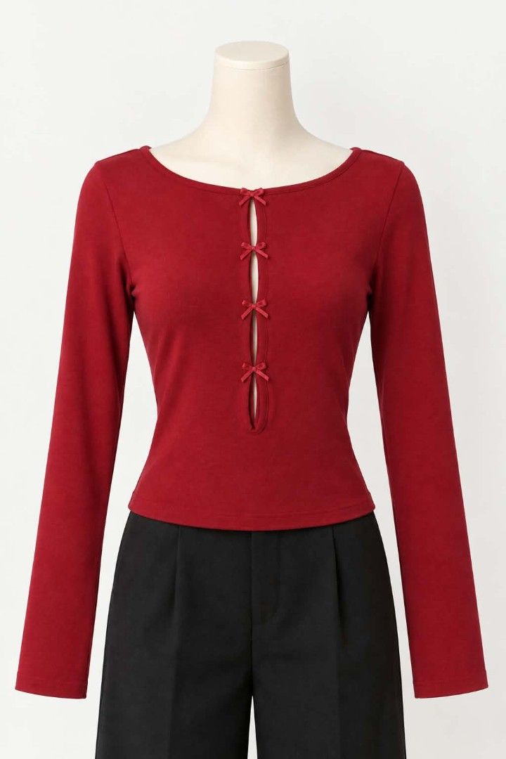 Red Bow Front Cutout Long Sleeve Top (Category: Longsleeves) located in Manila. Submitted by _sj1204 (Listing ID 1468409569, Image 2). Description: - Color: Red - Design: Round neckline with center cutout and 4 ribbon bow accents - Fit: Fitted silhouette made from soft, stretchy ribbed material - Styling: Versatile piece, perfect to pair with skirts or trousers for day or night - Condition: very like new (worn only once).