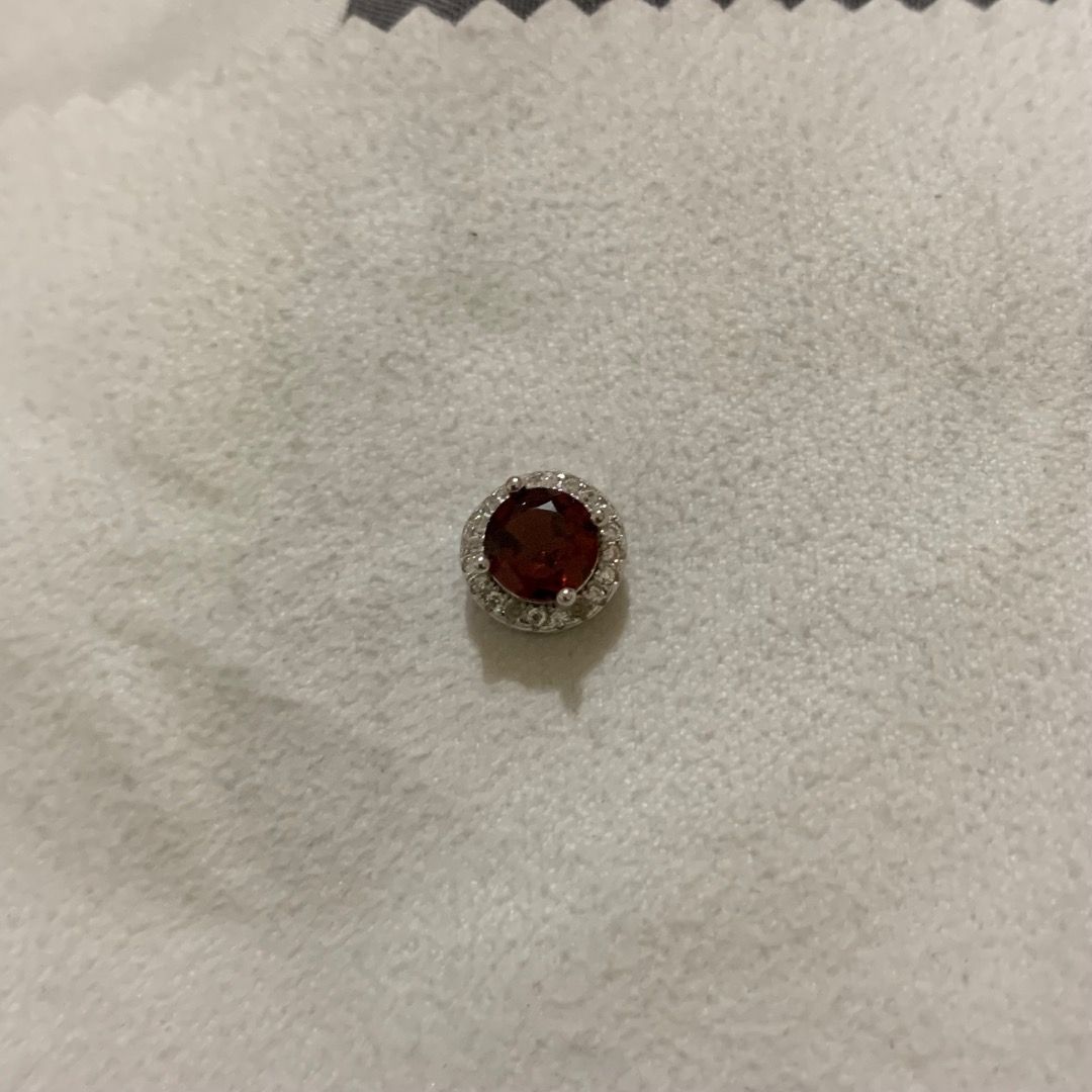 Round-cut Red Garnet pendant with Certificate (Category: Necklaces) located in Quezon City. Submitted by itscxyy (Listing ID 1468343279, Image 3). Description: - With gemstone certificate - Design: Round deep red garnet stone with a sparkling clear crystal halo - Setting: Silver-tone metal with secure prong setting - Note: Pendant only, no chain included.