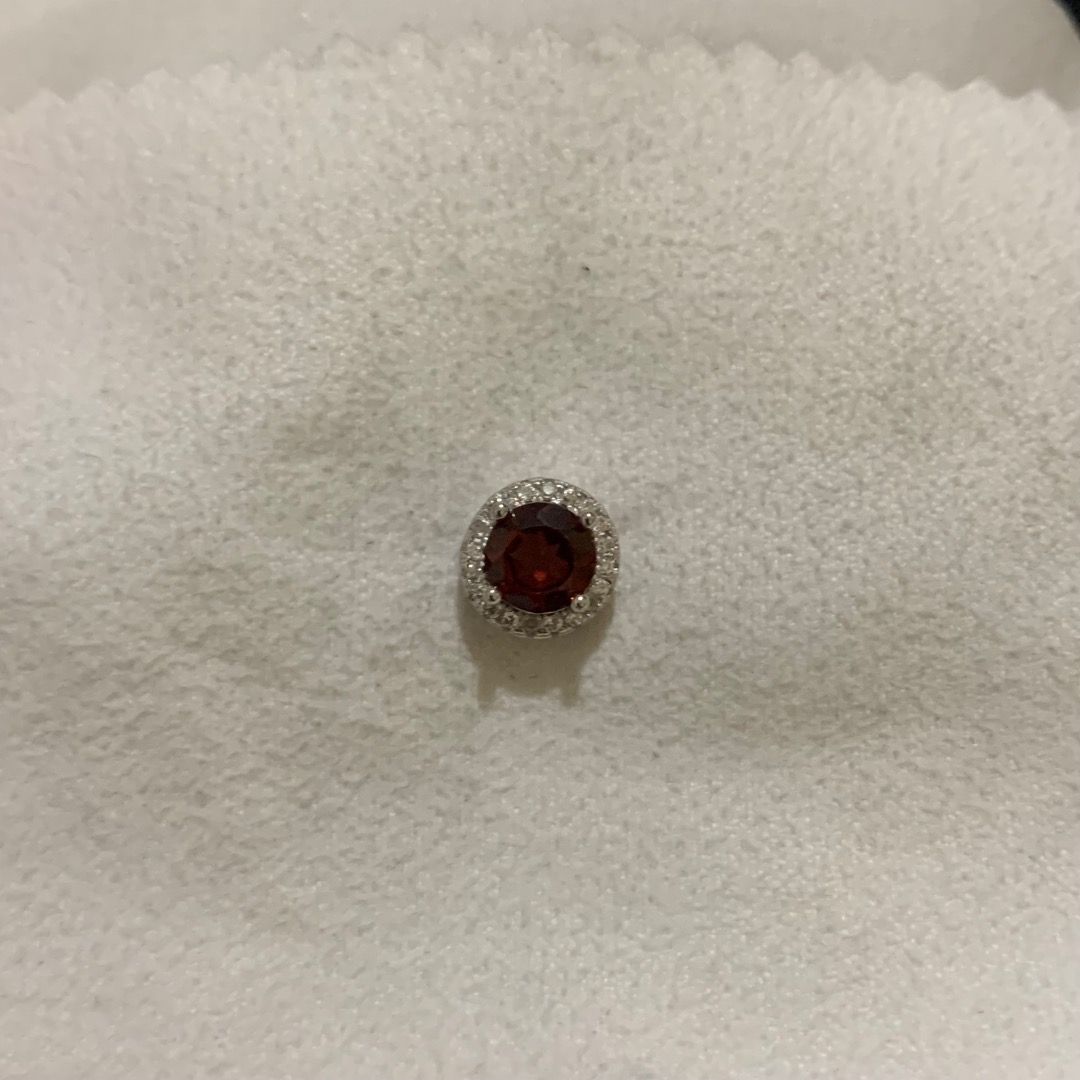 Round-cut Red Garnet pendant with Certificate (Category: Necklaces) located in Quezon City. Submitted by itscxyy (Listing ID 1468343279, Image 1). Description: - With gemstone certificate - Design: Round deep red garnet stone with a sparkling clear crystal halo - Setting: Silver-tone metal with secure prong setting - Note: Pendant only, no chain included.
