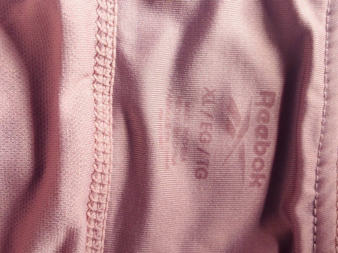 Reebok pink athletic workout shorts size XL (Category: Shorts) located in Marikina City. Submitted by boutiquekoh (Listing ID 1468310905, Image 2). Description: - Brand: Reebok - Color: Pink - Size: XL (printed inside waistband) - Material: Lightweight activewear fabric - Features: Comfortable elastic waist, Reebok logo near hemline - Ideal for: Running, gym workouts, or casual lounging.