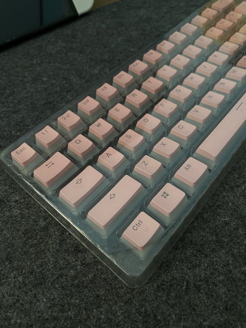RG Beast Pink Pudding Keycap Set (Category: Computer Keyboard) located in Paranaque City. Submitted by cheska.zaldivar (Listing ID 1468357707, Image 1). Description: Selling my pre-loved Pink Pudding Keycaps! :) Details: • Condition: Used – Good / Well-maintained • Layout: 104-Key Full Size (compatible with most full-size, TKL, and compact mechanical keyboards using Cherry MX style switches) • Material: Durable PBT with translucent “pudding” dual