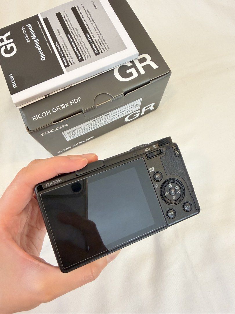 Ricoh GR IIIx HDF Digital Camera - Excellent Condition (Category: Cameras) located in Mandaluyong City. Submitted by kathhh6 (Listing ID 1468288253, Image 2). Description: Selling my Ricoh GR IIIx HDF in excellent condition. • Only 2,200+ shots taken • Well taken care of • Always used with a silicone protective case • Tempered glass screen protector applied since day one • Fully functional and well maintained Selling because mostly kept in storag