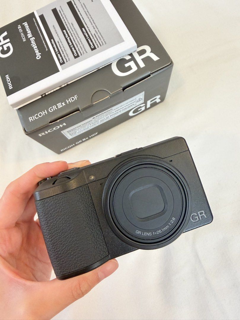 Ricoh GR IIIx HDF Digital Camera - Excellent Condition (Category: Cameras) located in Mandaluyong City. Submitted by kathhh6 (Listing ID 1468288253, Image 1). Description: Selling my Ricoh GR IIIx HDF in excellent condition. • Only 2,200+ shots taken • Well taken care of • Always used with a silicone protective case • Tempered glass screen protector applied since day one • Fully functional and well maintained Selling because mostly kept in storag