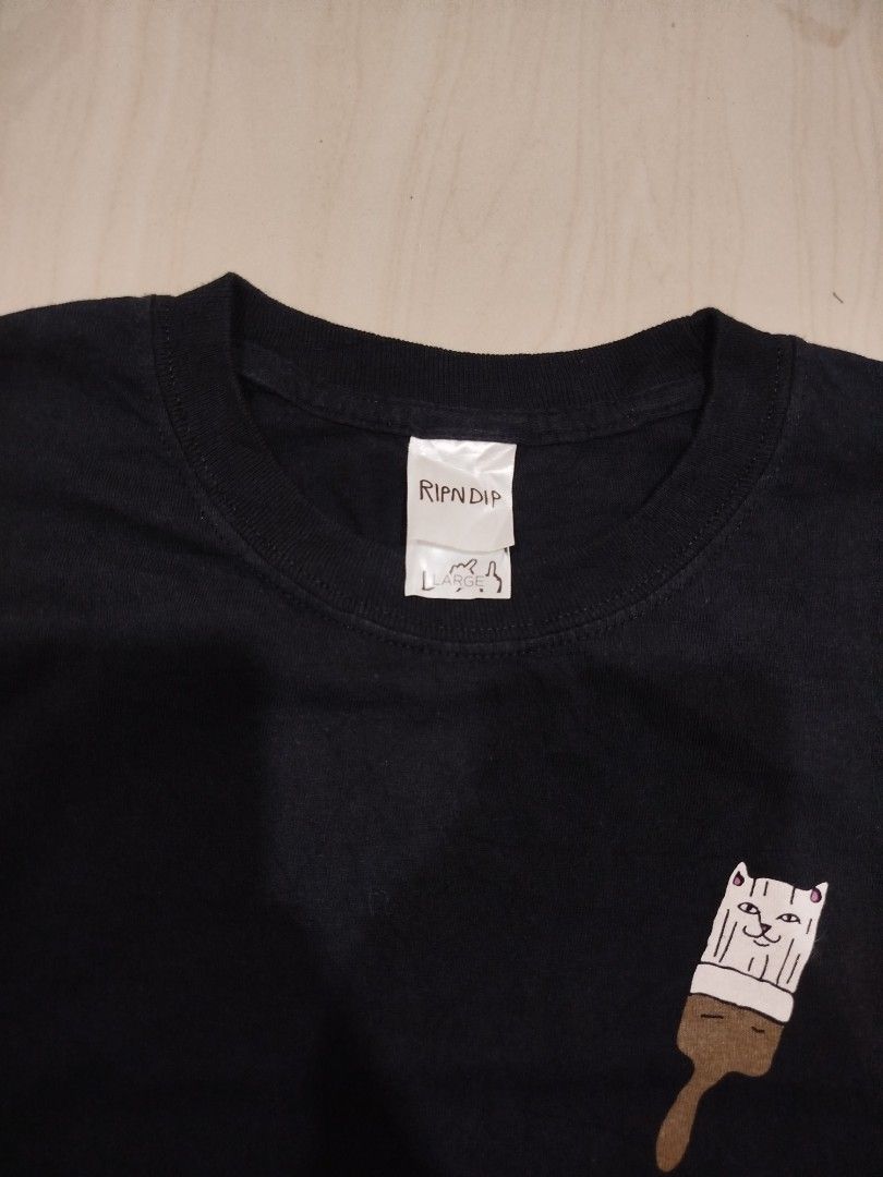 RIPNDIP Bob Ross Long Sleeve (Category: Tshirts & Polo Shirts ) located in Aroroy. Submitted by dr0p-a-dr1p (Listing ID 1468330560, Image 3). Description: Width: 21 Length: 27 10/10 color rate - Brand: Ripndip - Style: Black long sleeve crewneck shirt - Condition: Brand new with tags attached - Size: Large - Design details: Large Bob Ross cat landscape graphic on the back, small paintbrush on the chest, and colorful paint splatters on both sleeve
