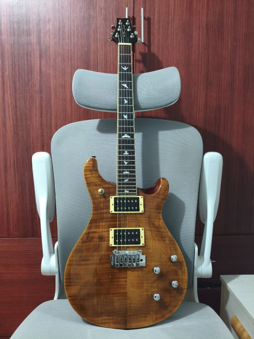 RJ Tonemaster Deluxe Plus (PRS Style with Flame Maple Top) (Category: Musical Instruments) located in Caloocan City. Submitted by juzztine22 (Listing ID 1468293346, Image 2). Description: Selling my RJ Tonemaster Deluxe Plus electric guitar. inspired by a PRS design, featuring beautiful bird fretboard inlays and flame maple top finish. with split coil for strat and les paul tone for versatile player. very well maintained and kept clean. Set up by