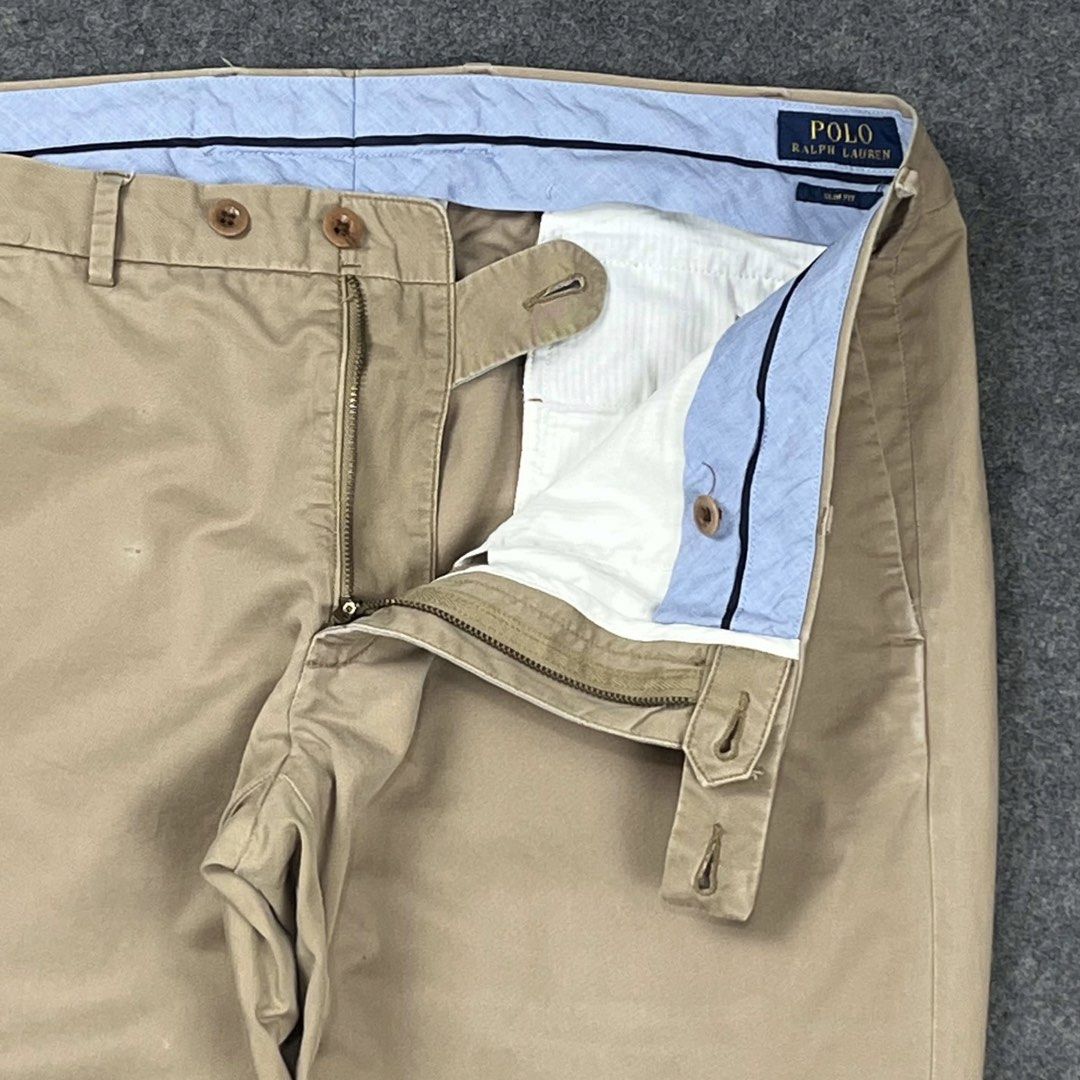 RL Polo beige chino pants (Category: Trousers) located in Zamboanga. Submitted by rag_20 (Listing ID 1468464473, Image 3). Description: RL Polo beige chino pants in a classic khaki/beige shade. They feature a standard flat-front design, straight or slim tailoring, a button-tab closure mechanism at the waist, and a clean curtained inner waistband lining. size: 36x32 19 Waist 11 Front rise 12 Thigh 42 Length 7.5 Hem Condition: 9/10 Issue: Scratches