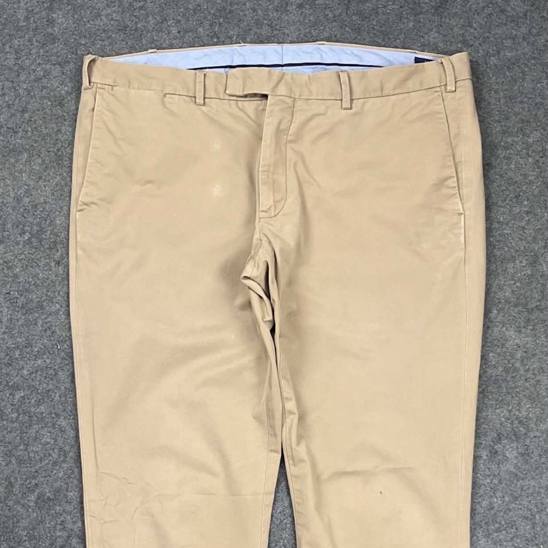 RL Polo beige chino pants (Category: Trousers) located in Zamboanga. Submitted by rag_20 (Listing ID 1468464473, Image 2). Description: RL Polo beige chino pants in a classic khaki/beige shade. They feature a standard flat-front design, straight or slim tailoring, a button-tab closure mechanism at the waist, and a clean curtained inner waistband lining. size: 36x32 19 Waist 11 Front rise 12 Thigh 42 Length 7.5 Hem Condition: 9/10 Issue: Scratches