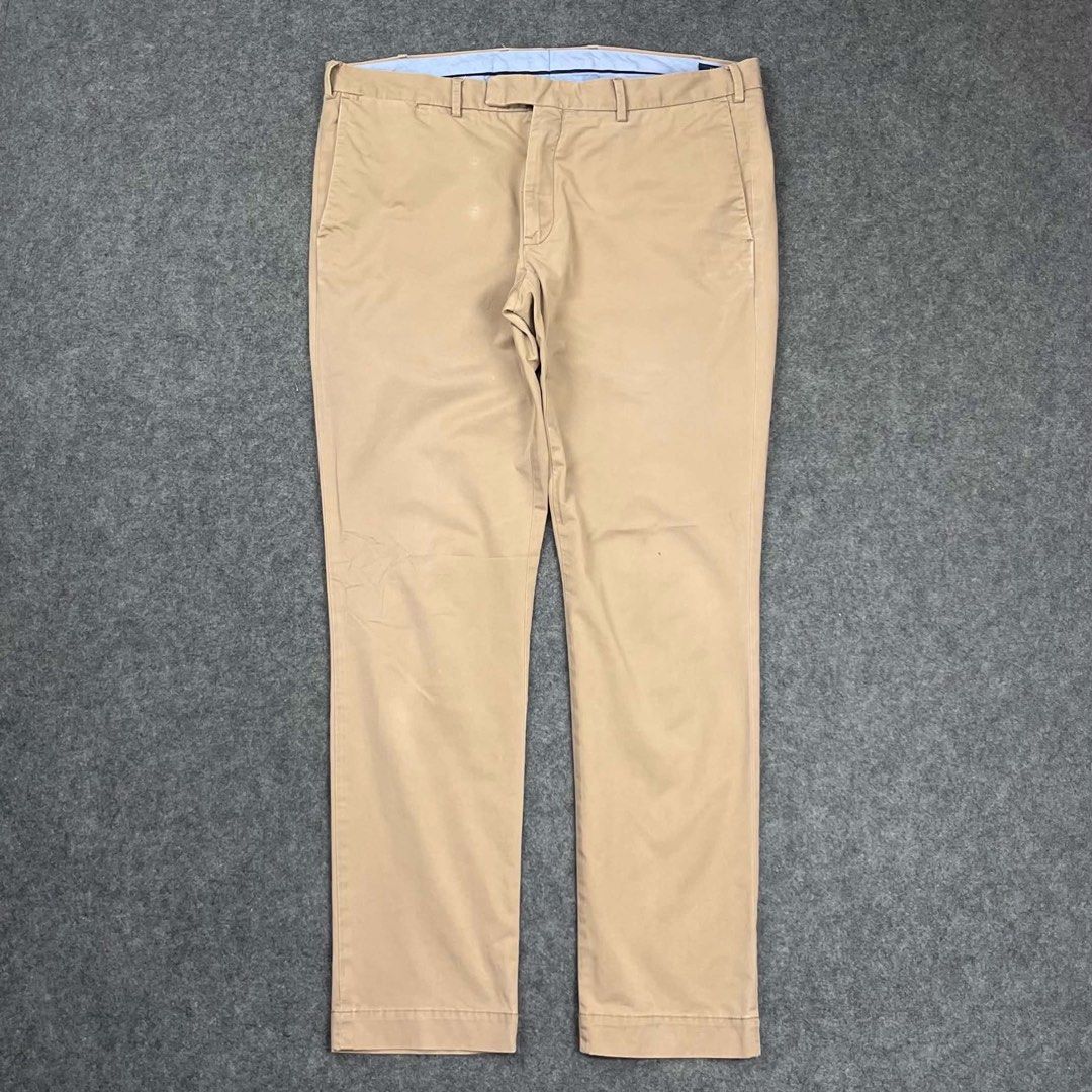 RL Polo beige chino pants (Category: Trousers) located in Zamboanga. Submitted by rag_20 (Listing ID 1468464473, Image 1). Description: RL Polo beige chino pants in a classic khaki/beige shade. They feature a standard flat-front design, straight or slim tailoring, a button-tab closure mechanism at the waist, and a clean curtained inner waistband lining. size: 36x32 19 Waist 11 Front rise 12 Thigh 42 Length 7.5 Hem Condition: 9/10 Issue: Scratches