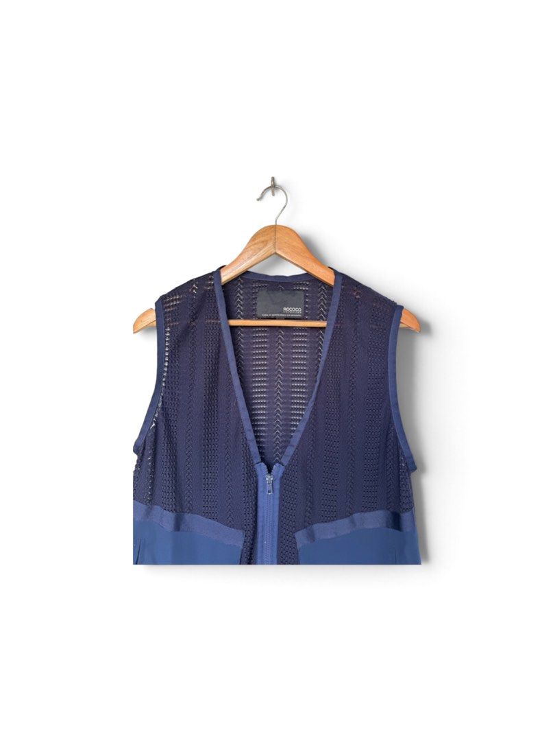 ROCOCO Navy Blue VEST (Category: Coats, Jackets and Outerwear) located in Quezon City. Submitted by chrizcboutique (Listing ID 1468305542, Image 2). Description: ROCOCO navy Blue VEST in medium size with 2 front pockets with front zipper Measurements laid in flat shoulder to shoulder approx 14.5 inches armpit to armpit approx 22 inches lenght approx 24.5 inches stretchable material Condition still in good condition lightly use no visible flaws on