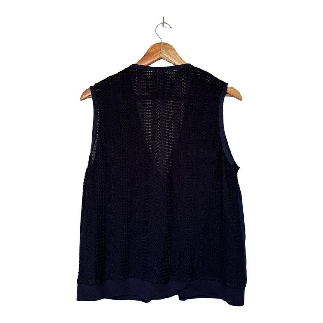 ROCOCO Navy Blue VEST (Category: Coats, Jackets and Outerwear) located in Quezon City. Submitted by chrizcboutique (Listing ID 1468305542, Image 3). Description: ROCOCO navy Blue VEST in medium size with 2 front pockets with front zipper Measurements laid in flat shoulder to shoulder approx 14.5 inches armpit to armpit approx 22 inches lenght approx 24.5 inches stretchable material Condition still in good condition lightly use no visible flaws on