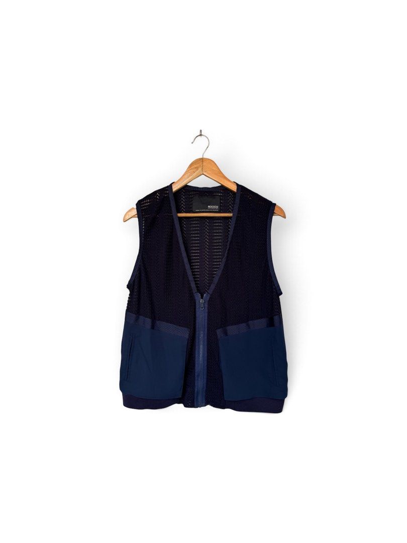 ROCOCO Navy Blue VEST (Category: Coats, Jackets and Outerwear) located in Quezon City. Submitted by chrizcboutique (Listing ID 1468305542, Image 1). Description: ROCOCO navy Blue VEST in medium size with 2 front pockets with front zipper Measurements laid in flat shoulder to shoulder approx 14.5 inches armpit to armpit approx 22 inches lenght approx 24.5 inches stretchable material Condition still in good condition lightly use no visible flaws on