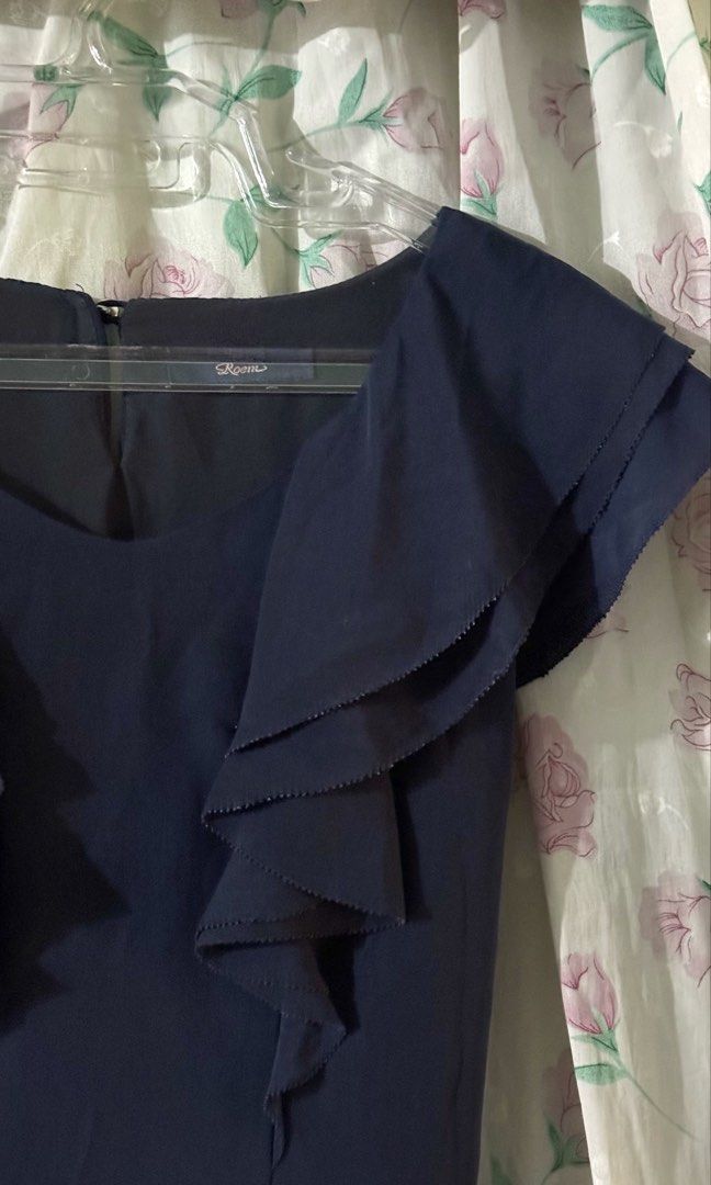 Roem Navy Blue Ruffle Eyelet bubble Dress (Category: Dresses) located in Calauan. Submitted by bellabells_thrifthings (Listing ID 1468430342, Image 2). Description: - Brand: Roem - Size: Small to Medium (S/M) - Color: Navy Blue - Design: Scoop neckline with layered shoulder ruffles - Waist: Dropped waist with multi-layered ruffled skirt - Details: Beautiful laser-cut eyelet embroidery - Closure: Back neck button closure - Condition: Has minimal f