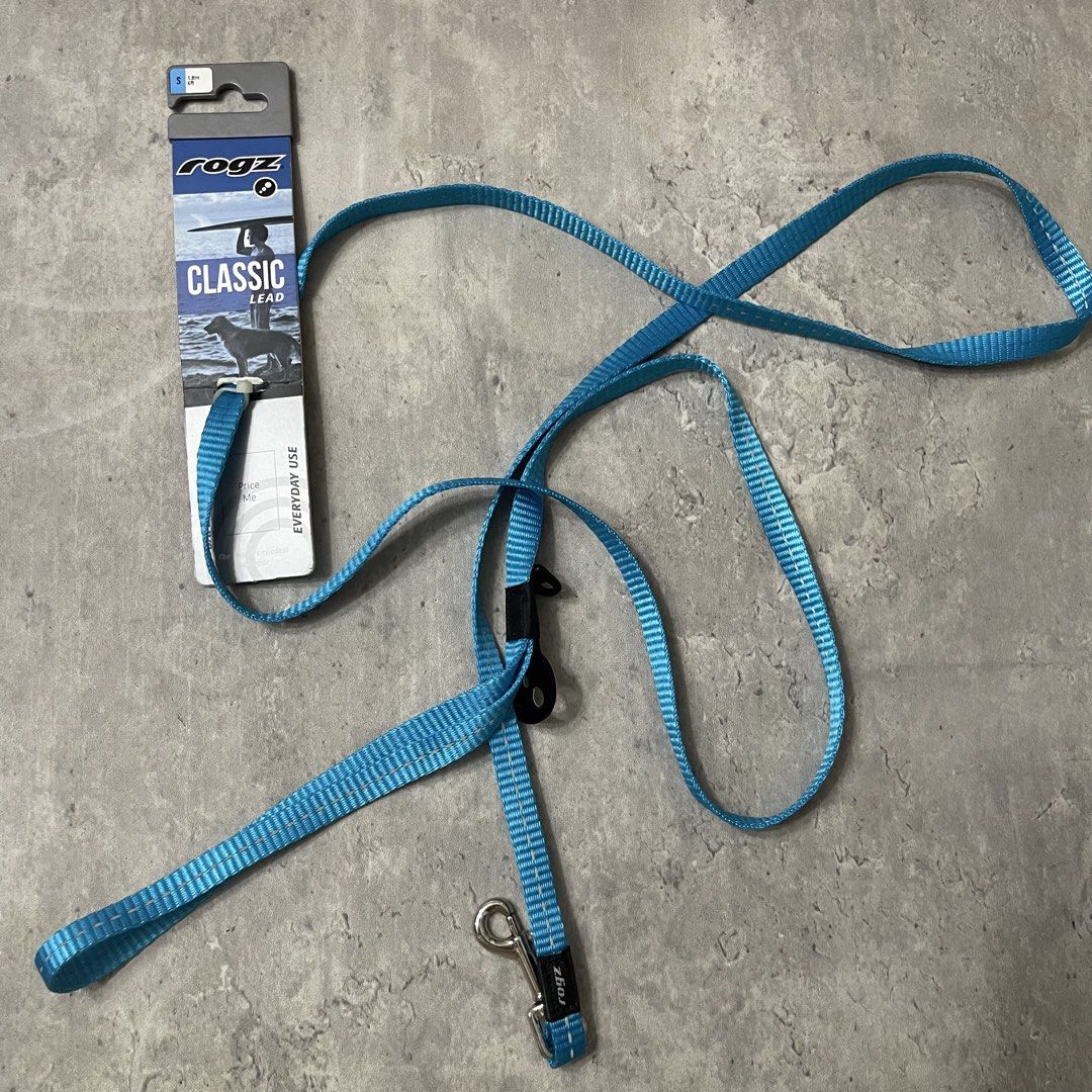 Rogz Utility Classic Dog / Cat Lead Small Turquoise (Category: Homes & Other Pet Accessories) located in General Trias. Submitted by abellu (Listing ID 1468385564, Image 1). Description: - Brand new with original store tag and packaging - Color: Vibrant turquoise blue - Size: Small (1.8 meters / 6 feet long) - Weight capacity: Ideal for dogs weighing 8 to 14 kg - Material: Highly durable nylon webbing - Hardware: Sturdy metal snap hook with an ex