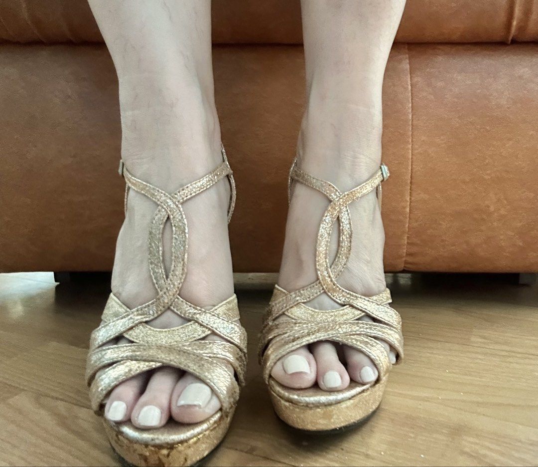 Rose Gold High Heel Platform Sandals Size 37 (Category: Heels) located in Makati City. Submitted by good_deals2026 (Listing ID 1468318291, Image 2). Description: - Item: Gold strappy platform stiletto heels - Limited edition - Size: 37 - Design: Metallic finish, multi-strap cutout front, and adjustable ankle buckle closure - Comfort: Platform sole under the toe area for extra height and stability - Condition: Moderate wear on the inner soles and 