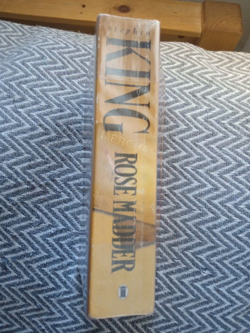 Rose Madder by Stephen King paperback novel (Category: Storybooks) located in Bacolor. Submitted by appletun (Listing ID 1468362021, Image 2). Description: all sales final. no returns/refunds/exchange. mop: gcash. no cod/cop/sco. handling/mod: spx +P70sf. - Title: Rose Madder by Stephen King - Format: Paperback edition - Cover: Distinctive yellow cover featuring credit cards and graphic art - Status: International bestseller - Condition: Readable