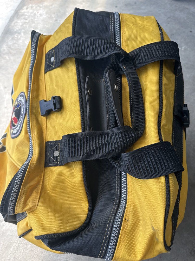 Rossignol Course Yellow Rolling Duffle Travel Bag (Category: Backpacks) located in Cainta. Submitted by shopbyyna (Listing ID 1468310620, Image 3). Description: - Authentic Rossignol Course rolling duffel bag in striking yellow and black - Equipped with sturdy wheels and a convenient retractable handle setup - Built with heavy-duty zippers for maximum durability - Dual carry straps plus a comfortable padded shoulder strap - Features unique embroi