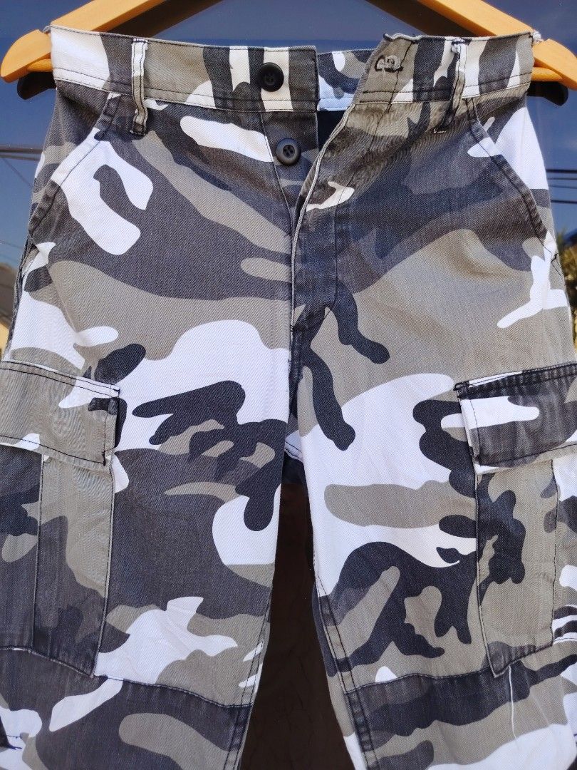 Rothco B.D.U Camo Cargo Pants (Category: Trousers) located in Paranaque City. Submitted by prettyboy26 (Listing ID 1468340055, Image 3). Description: FOR SALE: Rothco B.D.U. White/Grey Camo Cargo Pants 👖 ​Up for grabs is a pair of Rothco Battle Dress Uniform (B.D.U.) cargo pants in a sharp white, grey, and black camouflage pattern. Great condition and perfect for a rugged or streetwear look! ​Key Features: ​Brand: Rothco B.D.U. ​Style: White/Gre