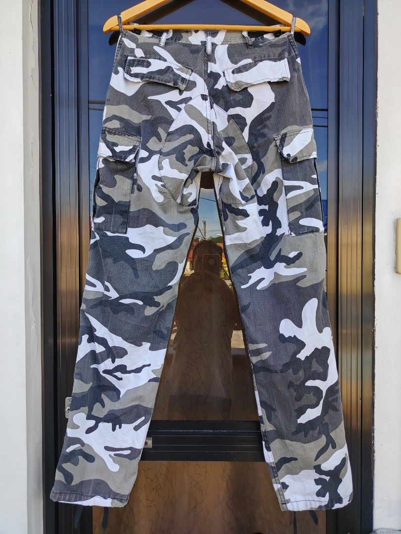 Rothco B.D.U Camo Cargo Pants (Category: Trousers) located in Paranaque City. Submitted by prettyboy26 (Listing ID 1468340055, Image 2). Description: FOR SALE: Rothco B.D.U. White/Grey Camo Cargo Pants 👖 ​Up for grabs is a pair of Rothco Battle Dress Uniform (B.D.U.) cargo pants in a sharp white, grey, and black camouflage pattern. Great condition and perfect for a rugged or streetwear look! ​Key Features: ​Brand: Rothco B.D.U. ​Style: White/Gre