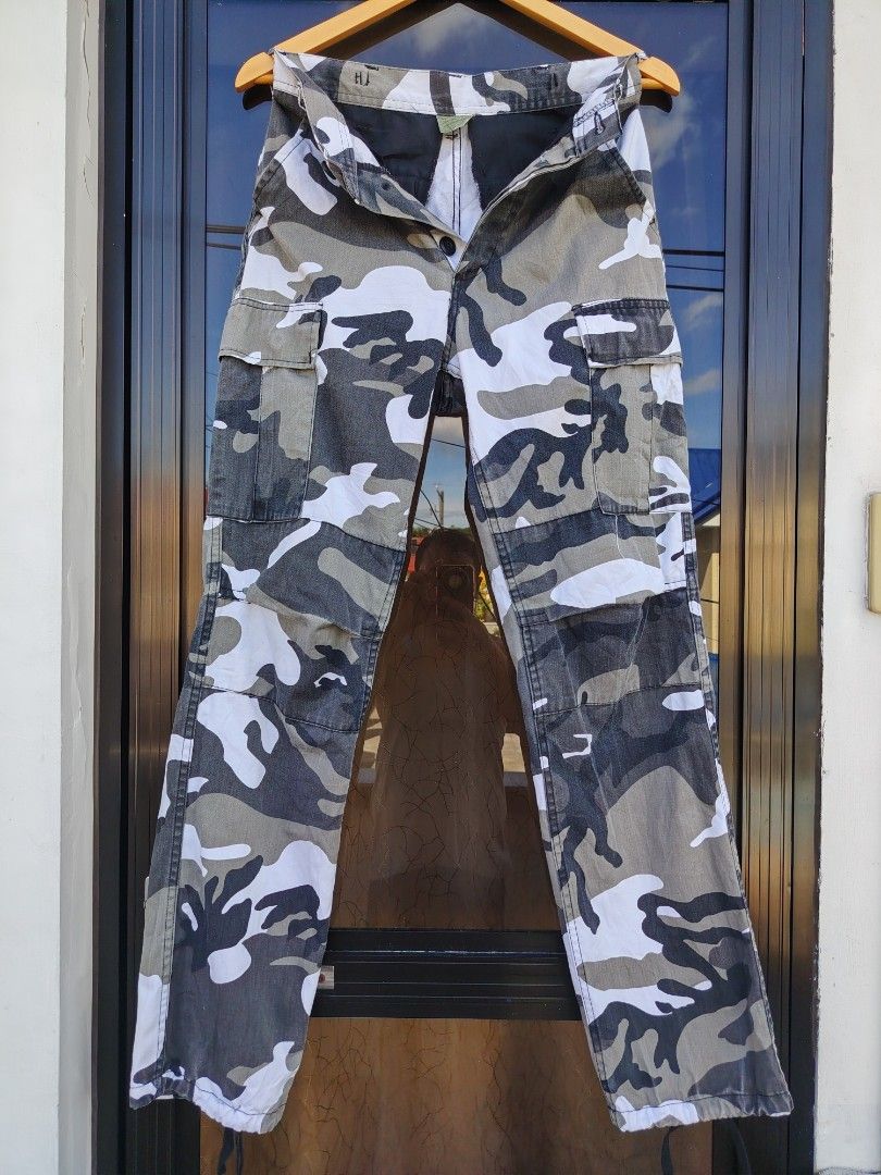 Rothco B.D.U Camo Cargo Pants (Category: Trousers) located in Paranaque City. Submitted by prettyboy26 (Listing ID 1468340055, Image 1). Description: FOR SALE: Rothco B.D.U. White/Grey Camo Cargo Pants 👖 ​Up for grabs is a pair of Rothco Battle Dress Uniform (B.D.U.) cargo pants in a sharp white, grey, and black camouflage pattern. Great condition and perfect for a rugged or streetwear look! ​Key Features: ​Brand: Rothco B.D.U. ​Style: White/Gre